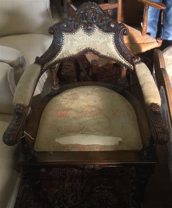 Victorian carved walnut open armchair